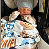newborn, baby, sleeping, car_seat, blanket, hat, gloves, infant, cute, cozy, child, animal_print, toddler, clothing, resting, safety_belt, portrait, indoors, cute_hat, peaceful