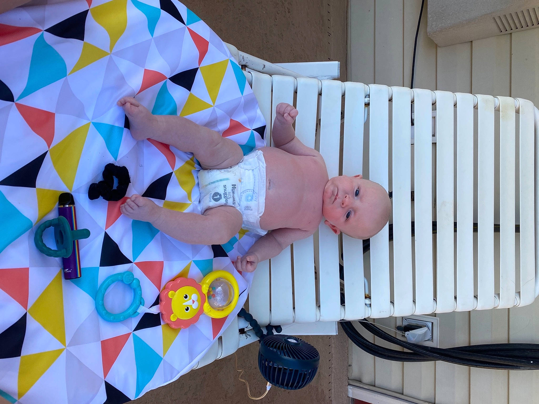 Cade is registered to the contest to win money with this photo: art, baby, baby_products, baby_safety, baby_toddler_clothing, child, circle, cradle, fun, hat, leisure, nursery, pattern, person, play, room, smile, toddler, triangle, visual_arts