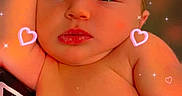 Holly joined the competition — help win amazing prizes! baby, infant, child, skin, arm, hand, face, expression, heart_overlay, sparkle_effect, indoor, casual_pose, cute, relaxed, closeup, portrait, digital_effect, adorable, newborn, resting