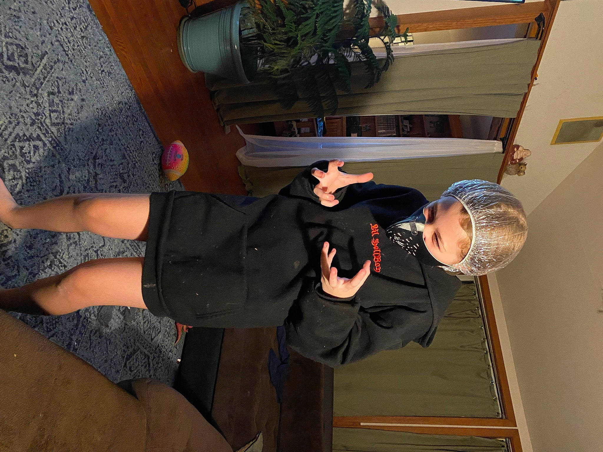 Elise is registered to the contest to win money with this photo: calf, ceiling, dress, elbow, foot, fun, gesture, hat, human_body, human_leg, joint, knee, person, room, shoulder, sportswear, suit, tableware, thigh, thumb