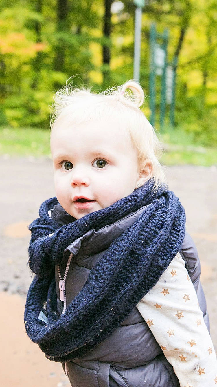 Aubree is registered to the contest to win money with this photo: baby, beauty, cheek, child, design, eye, face, head, leaf, outerwear, pattern, people, person, photograph, photography, portrait_photography, product, scarf, skin, toddler