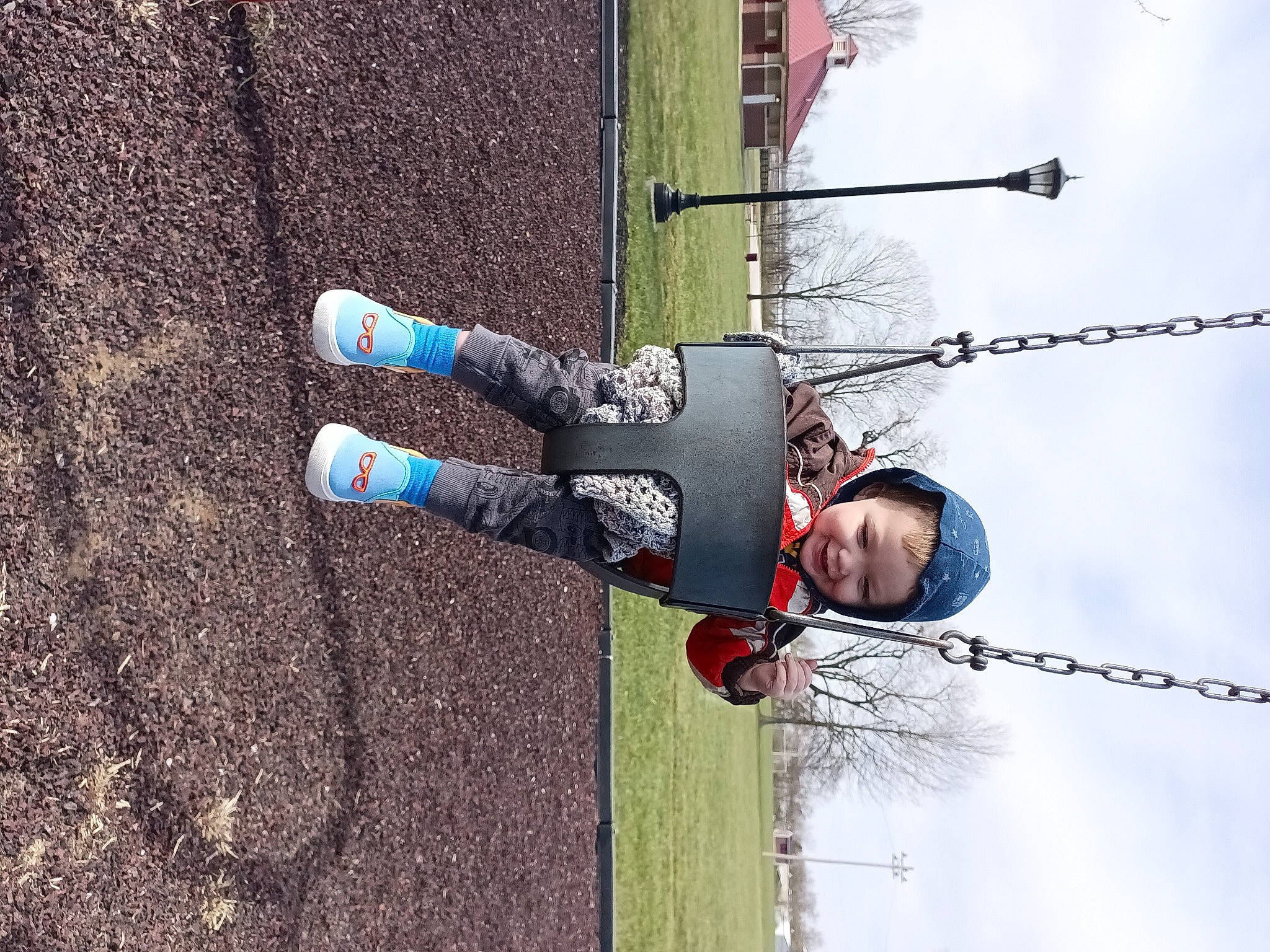 Ashton is registered to the contest to win money with this photo: adventure, cloud, electric_blue, electrical_supply, electricity, fun, headwear, joy, leisure, person, public_utility, recreation, rope, sky, soil, sports, tree, walking_shoe, wind, wire