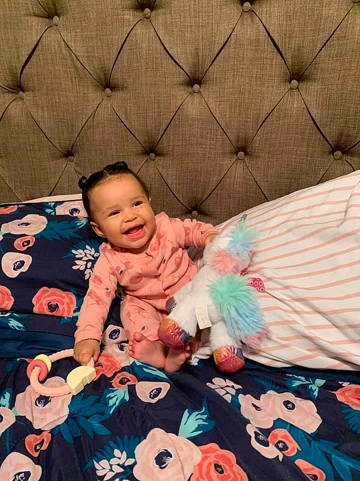 Rachel joined the competition — help win amazing prizes! baby, baby_products, baby_toddler_clothing, child, comfort, cool, eye, grass, happy, head, line, linens, pattern, person, petal, pink, sleeve, textile, toddler, toy