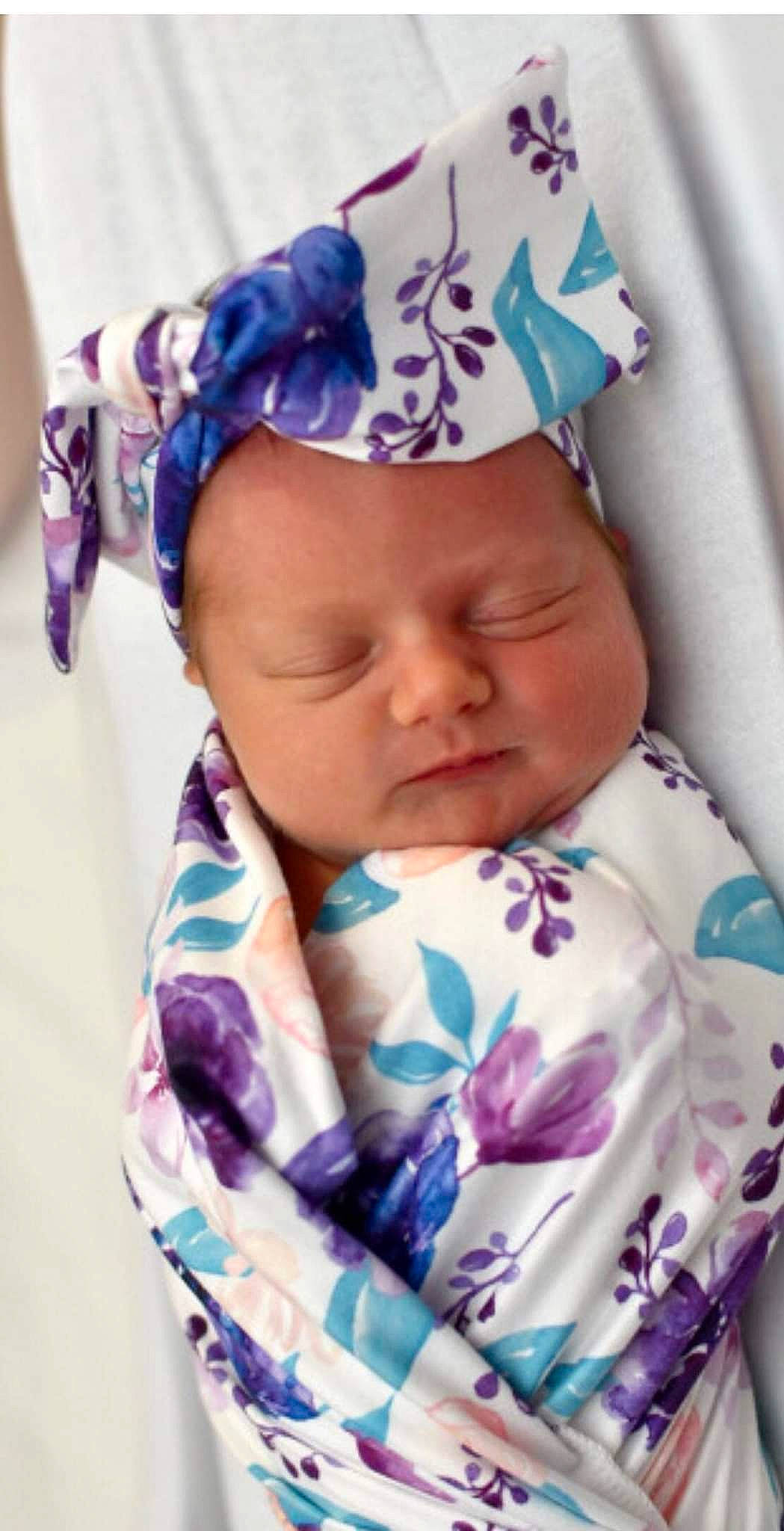 River joined the competition — help win amazing prizes! baby, baby_products, baby_toddler_clothing, cap, cheek, child, comfort, fashion_accessory, hair_accessory, happy, headgear, headwear, lip, magenta, pattern, person, pink, purple, skin, sleeve