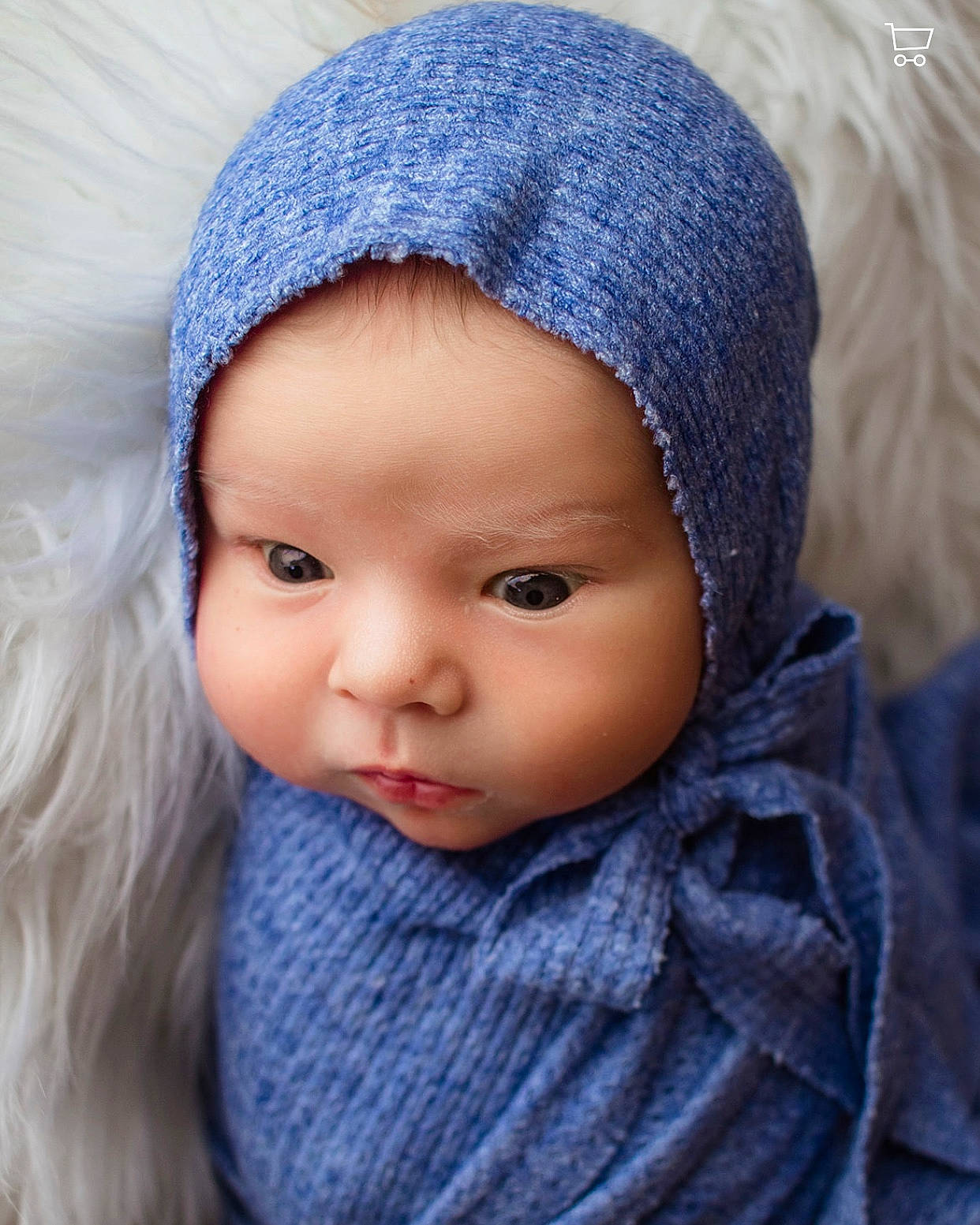 Taytum joined the competition — help win amazing prizes! baby, beanie, cap, cheek, child, close_up, creative_arts, electric_blue, face, fashion_accessory, fur, headgear, headwear, knit_cap, lip, organ, pattern, person, textile, toddler