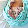 Levi is registered to the contest to win money with this photo: aqua, azure, baby, comfort, drinkware, electric_blue, eyelash, font, gesture, happy, human_body, linens, magenta, nail, pattern, service, textile, thumb, toddler, wrist