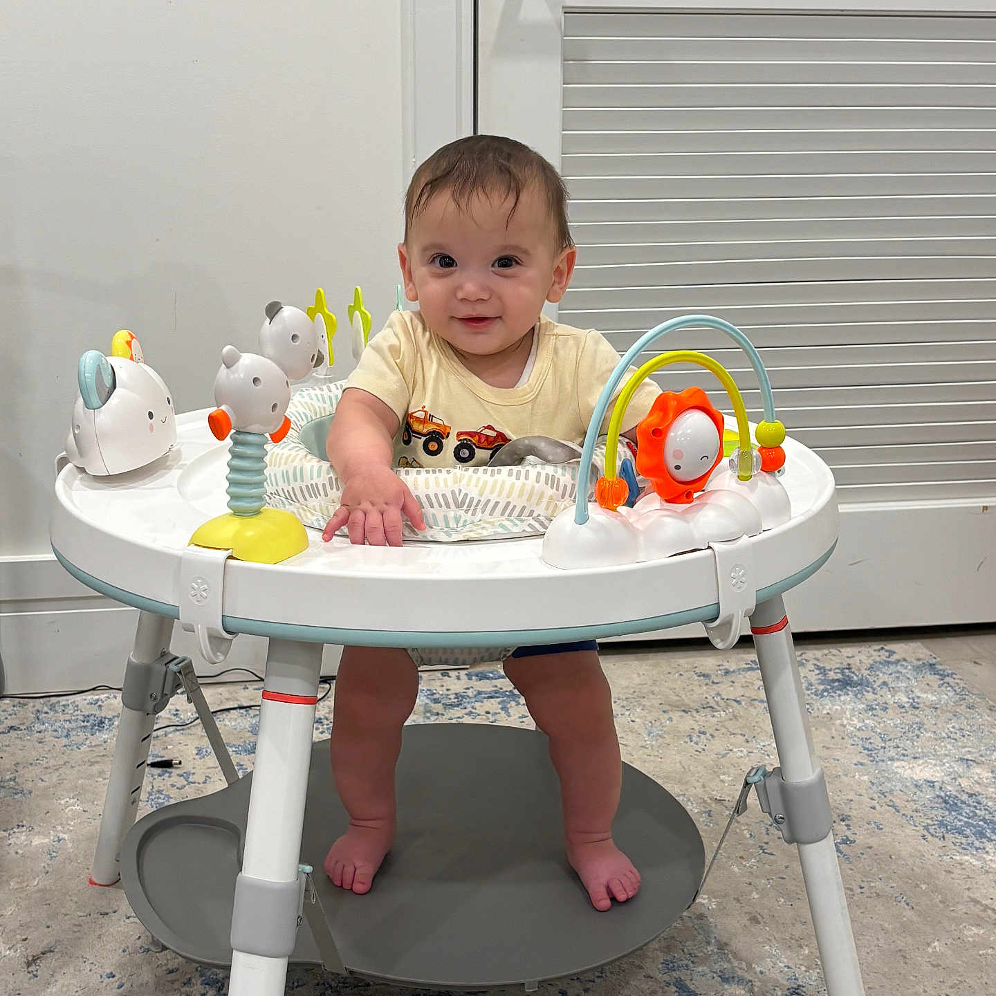 Nathan joined the competition — help win amazing prizes! baby, child, smiling, walker, toy, indoor, floor, carpet, door, person, clothing, feet, face, play, cute, infant, young, happy, standing, room