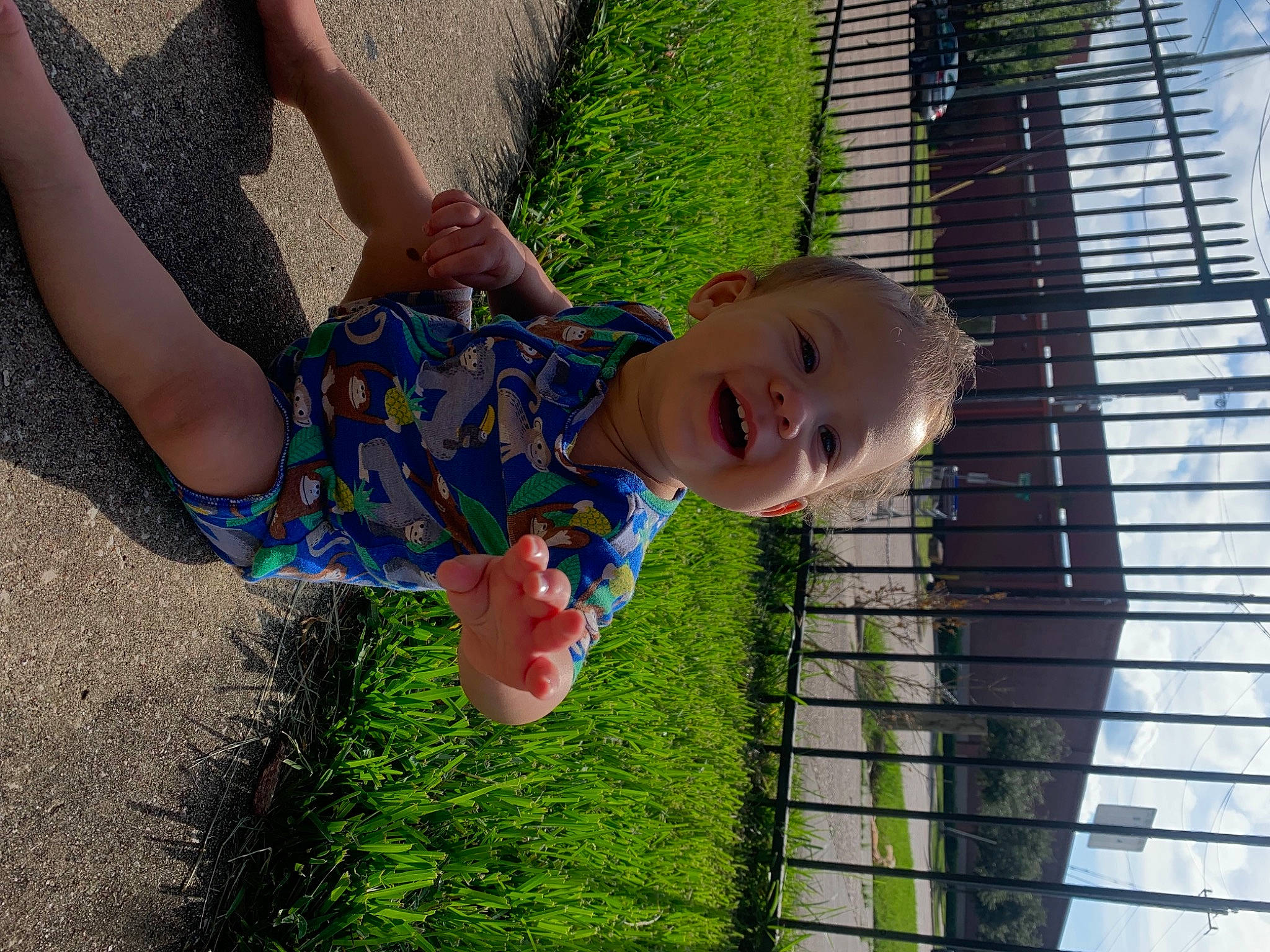 Devaughn joined the competition — help win amazing prizes! baby, baby_toddler_clothing, child, electric_blue, fun, grass, green, happy, human_leg, leisure, pattern, people_in_nature, person, plant, recreation, shadow, sitting, smile, toddler, tree