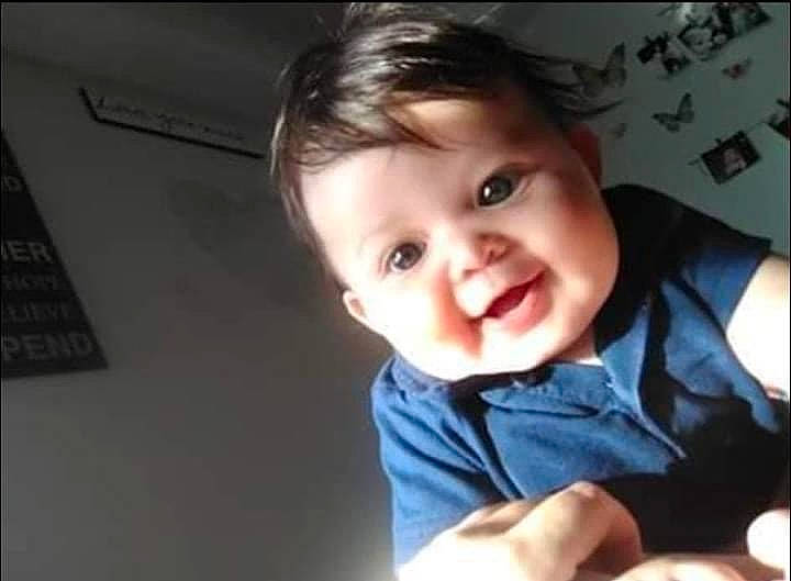 Jaxsyn is registered to the contest to win money with this photo: baby, baby_toddler_clothing, cheek, child, cool, eyebrow, eyelash, facial_expression, flash_photography, fun, gesture, happy, iris, mouth, nose, person, room, sleeve, smile, thumb