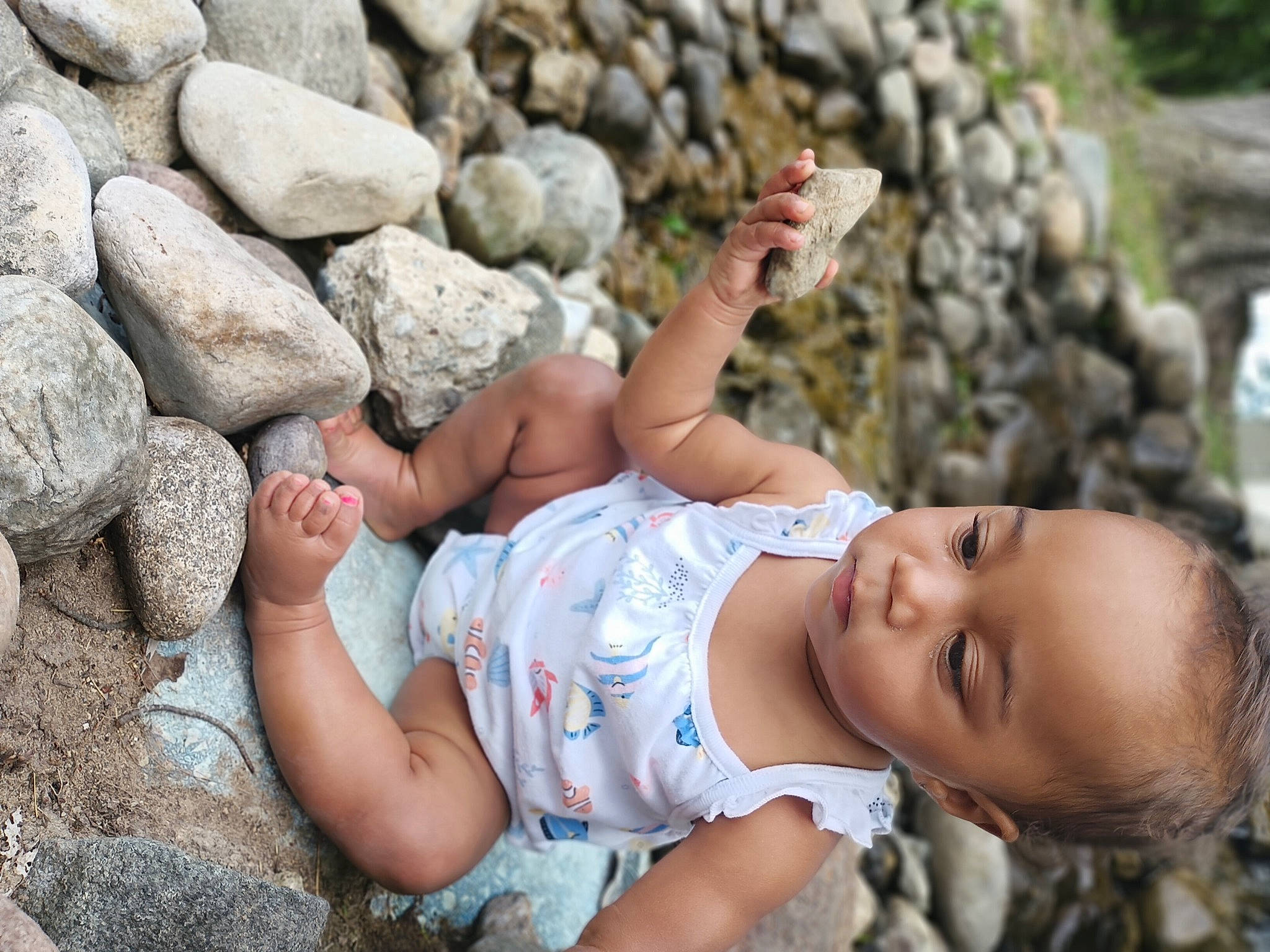 Raynie Marie joined the competition — help win amazing prizes! beauty, bedrock, chest, foot, fun, grass, hand, human_body, human_leg, leg, leisure, muscle, people_in_nature, person, plant, skin, summer, swimwear, thigh, toddler