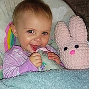 Serenity joined the competition — help win amazing prizes! baby, child, bottle, blanket, pink, purple, knitted, toy, bunny, smile, happy, indoor, cute, face, person, cozy, comfort, clothing, infant, portrait