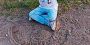 Joanne joined the competition — help win amazing prizes! child, clothing, face, female, footwear, girl, grass, head, jeans, nature, outdoors, pants, park, person, photography, plant, portrait, sitting, soil, t_shirt