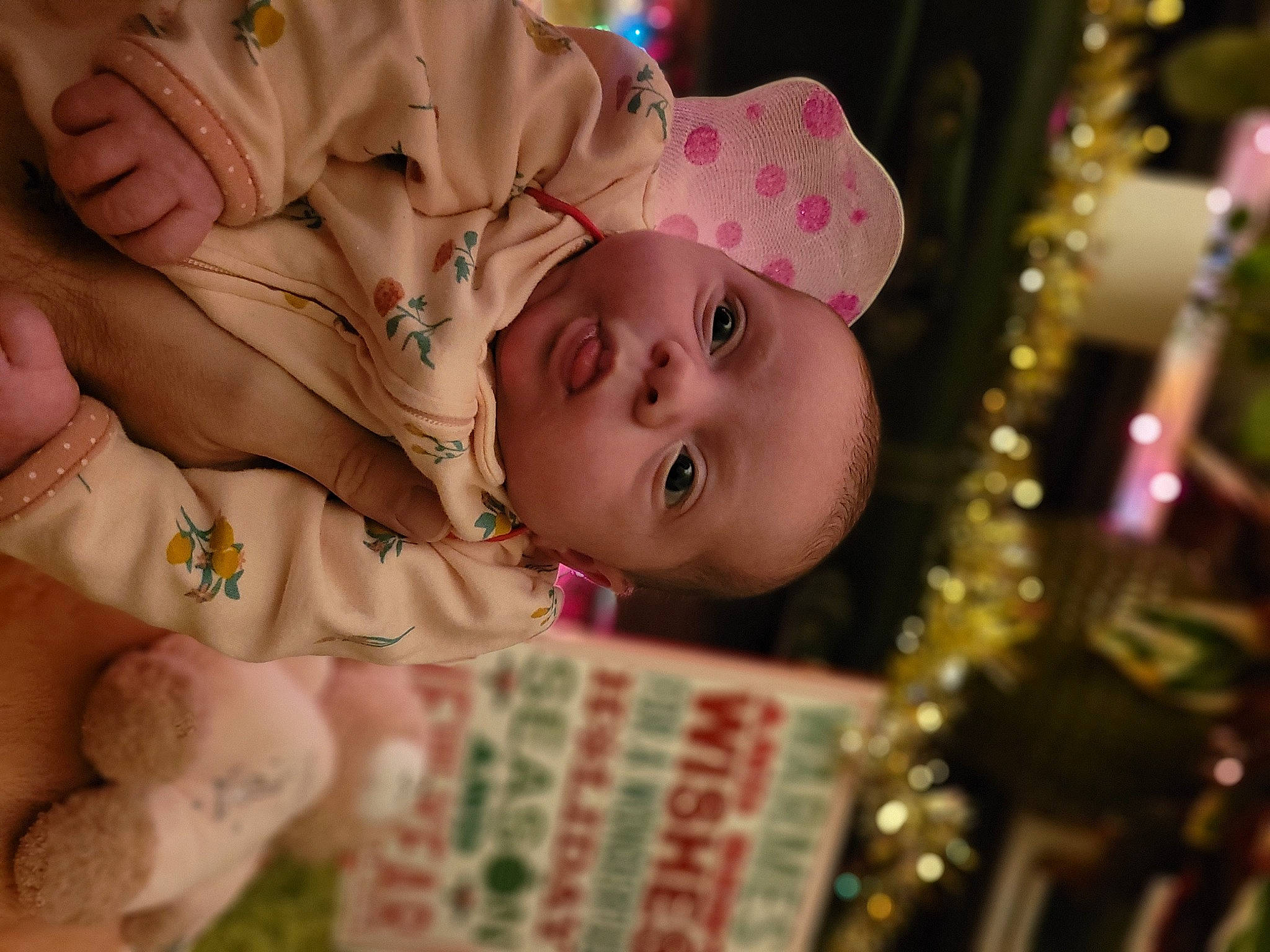 Raynee joined the competition — help win amazing prizes! baby, baby_toddler_clothing, cheek, child, christmas, christmas_ornament, event, facial_expression, fun, happy, holiday, iris, nose, ornament, person, pink, plant, skin, toddler, tradition
