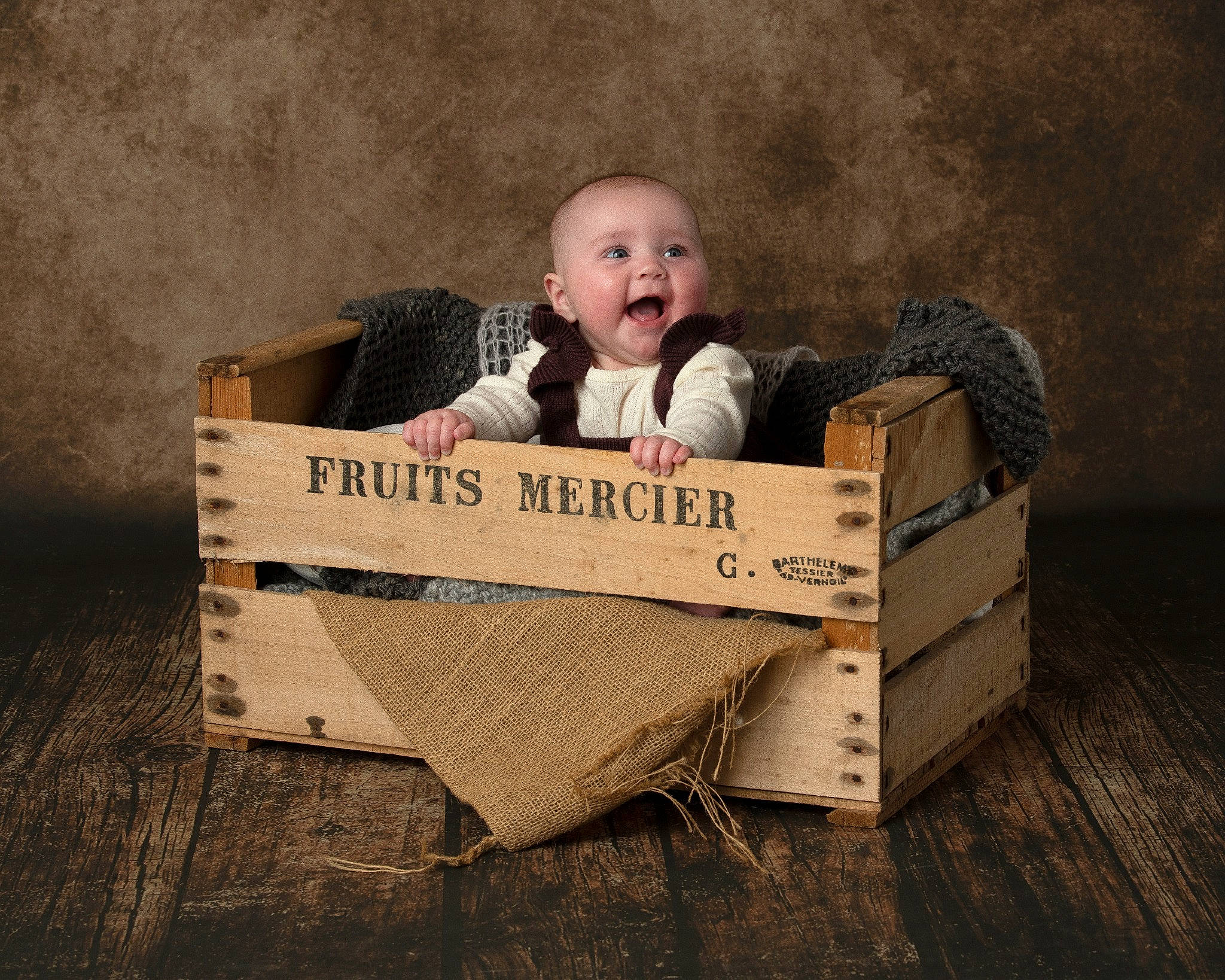 Cara is registered to the contest to win money with this photo: baby, baby_products, cardboard, child, comfort, flash_photography, flooring, grass, happy, hardwood, paper_product, people_in_nature, person, portrait_photography, sitting, smile, toddler, tree, vintage_clothing, wicker