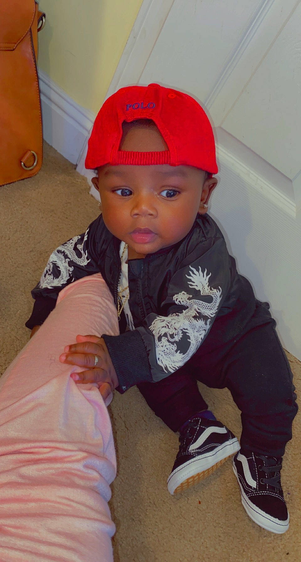 Cannon joined the competition — help win amazing prizes! baby_toddler_clothing, baseball_cap, cap, carmine, child, eye, fashion_accessory, floor, flooring, forehead, fun, headwear, lip, magenta, outerwear, person, pink, room, sitting, sleeve