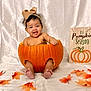 Harper joined the competition — help win amazing prizes! baby, pumpkin, headband, autumn_leaves, fall, seasonal, cute, child, smiling, orange, decoration, holiday, festive, sign, indoor, portrait, celebration, season, happy, infant