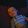 Phoenix joined the competition — help win amazing prizes! child, toddler, face, portrait, sleepwear, striped_shirt, indoor, soft_light, relaxing, baby, person, young_child, candid, smiling, cute, infant, resting, head, skin, casual