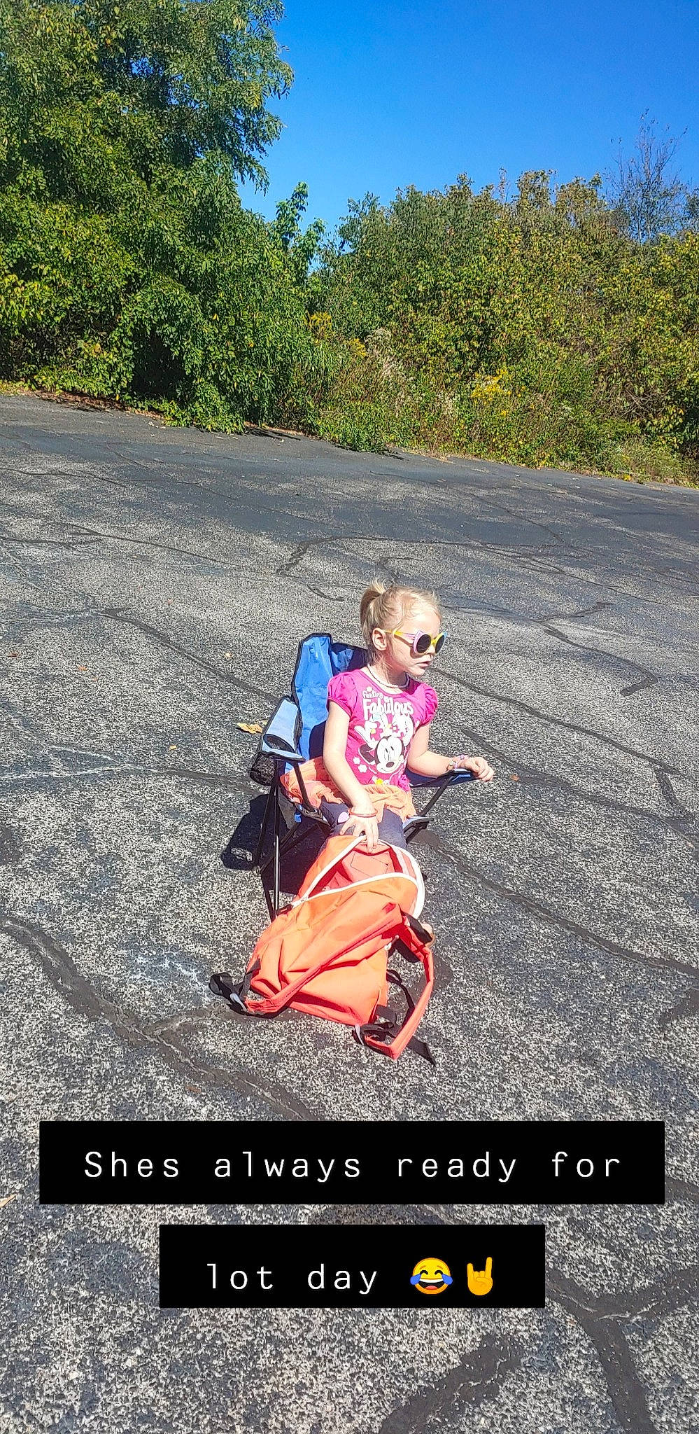 Chevelle is registered to the contest to win money with this photo: asphalt, baby_carriage, baby_products, font, grass, happy, landscape, leisure, people_in_nature, person, photo_caption, plant, recreation, road_surface, sitting, sky, soil, tints_and_shades, toddler, travel