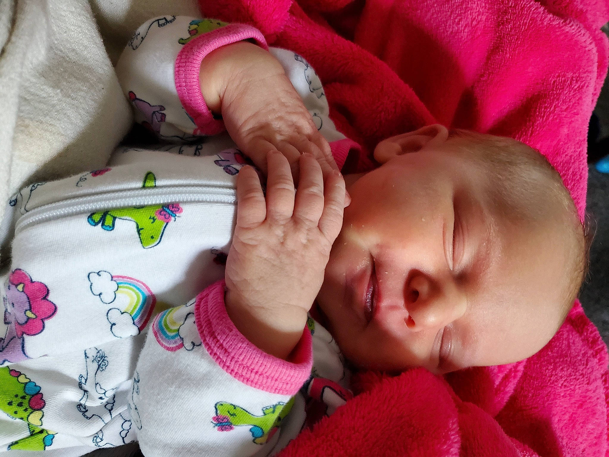 Gracelynn is registered to the contest to win money with this photo: baby, baby_toddler_clothing, cheek, comfort, ear, eye, eyebrow, eyelash, finger, gesture, hand, lip, mouth, nose, person, pink, red, skin, sleeve, textile