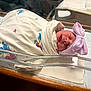 newborn, baby, hospital, bassinet, blanket, hat, bow, sleeping, infant, swaddled, bed, person, cute, pink, blue, white, soft, resting, newborn_baby, healthcare
