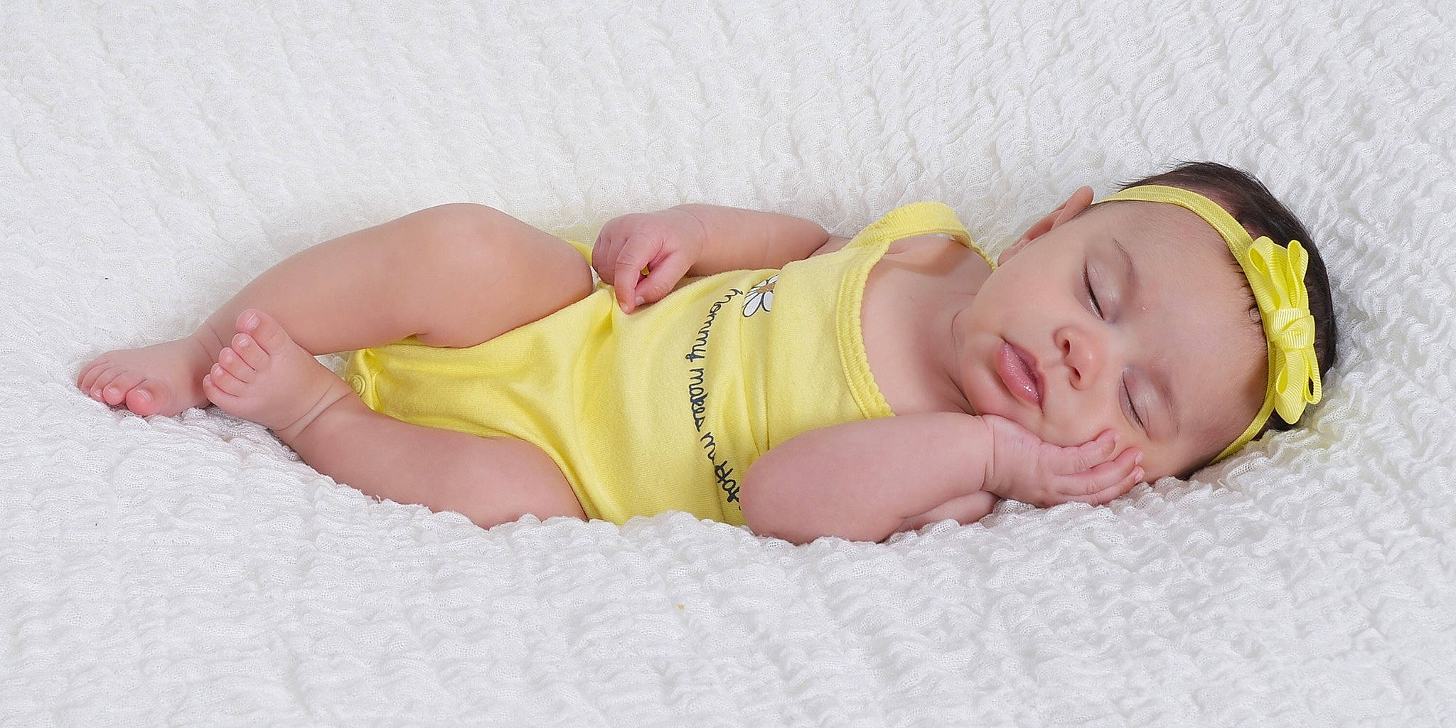 Amarii is registered to the contest to win money with this photo: abdomen, arm, baby, baby_sleeping, baby_toddler_clothing, brassiere, comfort, fashion_accessory, finger, foot, head, headwear, human_body, human_leg, lingerie, person, skin, swimwear, thigh, toddler
