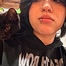 Queso joined the competition — help win amazing prizes! animal, black_cat, black_hair, casual, cat, close_up, curious_cat, expression, face, graphic_hoodie, hoodie, indoor, lip_ring, looking_sideways, nose_ring, person, pet, piercing, shoulder, wooden_ceiling