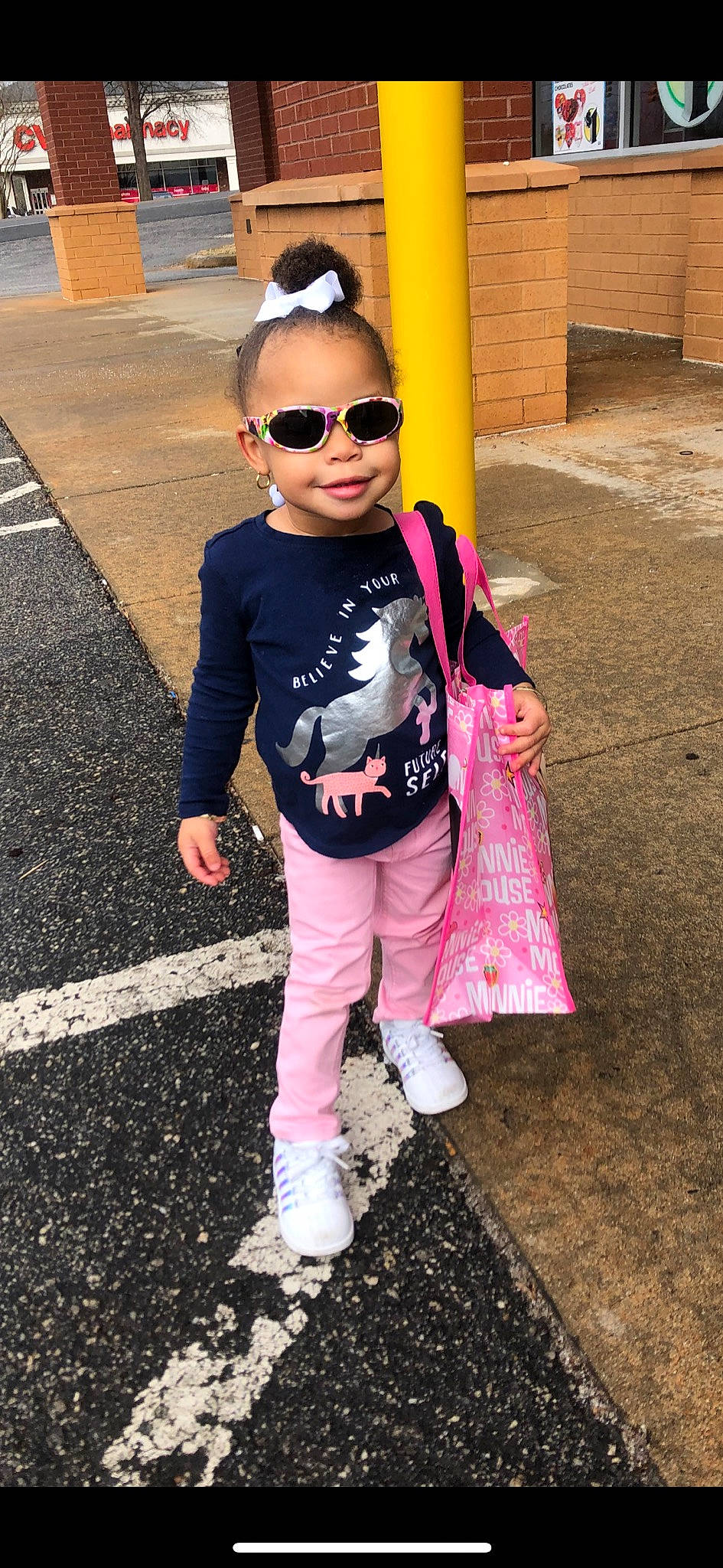 Khaliyah is registered to the contest to win money with this photo: child, clothing, cool, eyewear, fashion, footwear, fun, jacket, jeans, outerwear, person, pink, shoe, smile, street_fashion, style, sunglasses, t_shirt, toddler, trousers