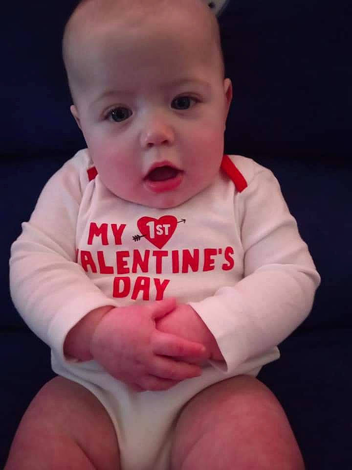 Brian is registered to the contest to win money with this photo: arm, baby_toddler_clothing, cheek, chin, comfort, eye, facial_expression, finger, hair, happy, human_body, iris, lip, mouth, neck, nose, person, skin, sleeve, stomach