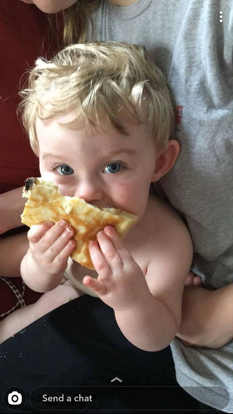 Christopher Jr is registered to the contest to win money with this photo: baked_goods, child, comfort_food, cuisine, dish, eating, fast_food, food, food_craving, junk_food, kids_meal, person, toddler