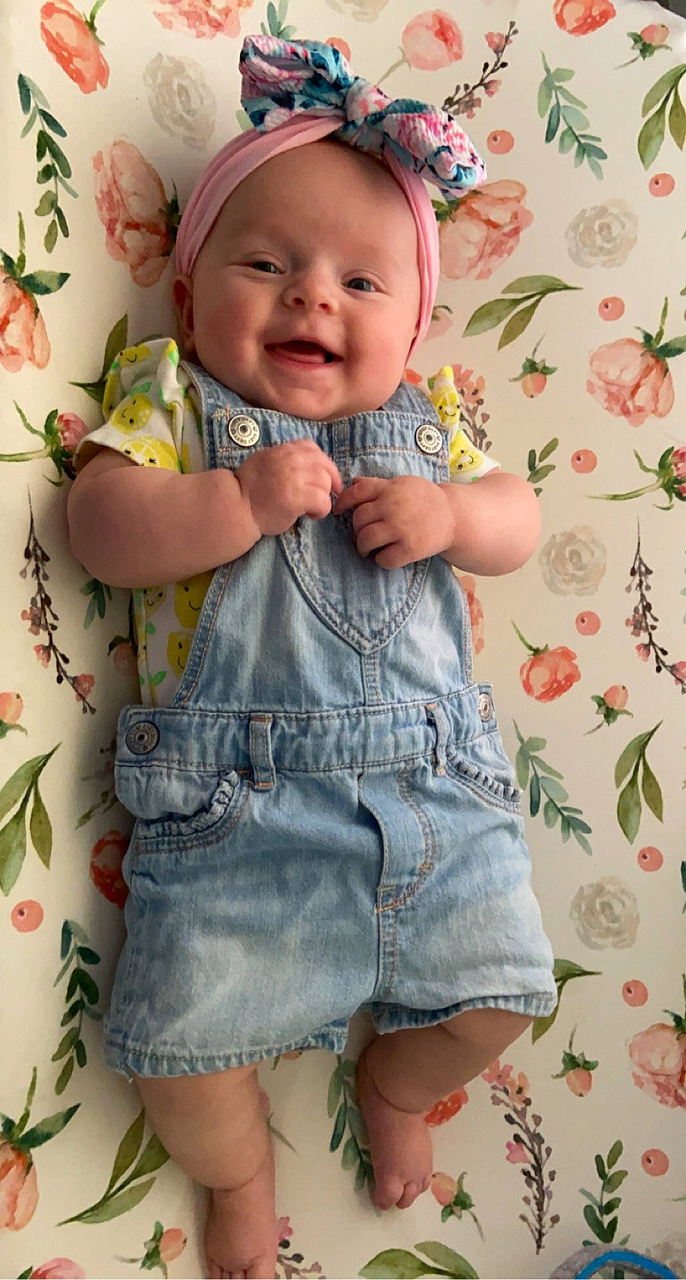 Coralee is registered to the contest to win money with this photo: baby, baby_toddler_clothing, cheek, clothing, facial_expression, gesture, happy, head, jean_short, lip, people_in_nature, person, photograph, pink, skin, sleeve, smile, standing, textile, toddler