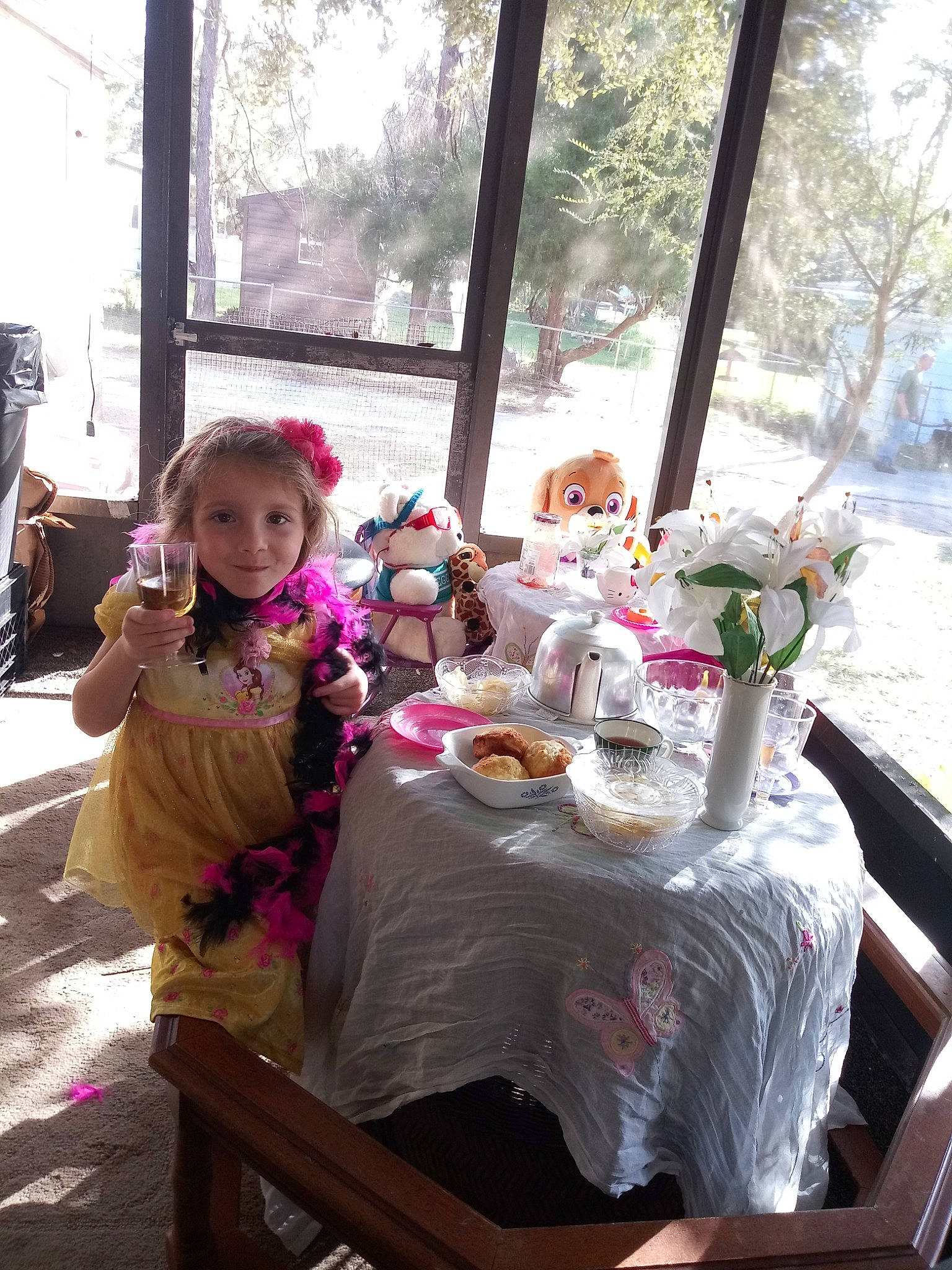 Jayme is registered to the contest to win money with this photo: child, event, flower, party, person, pink, recreation, table, tea_party