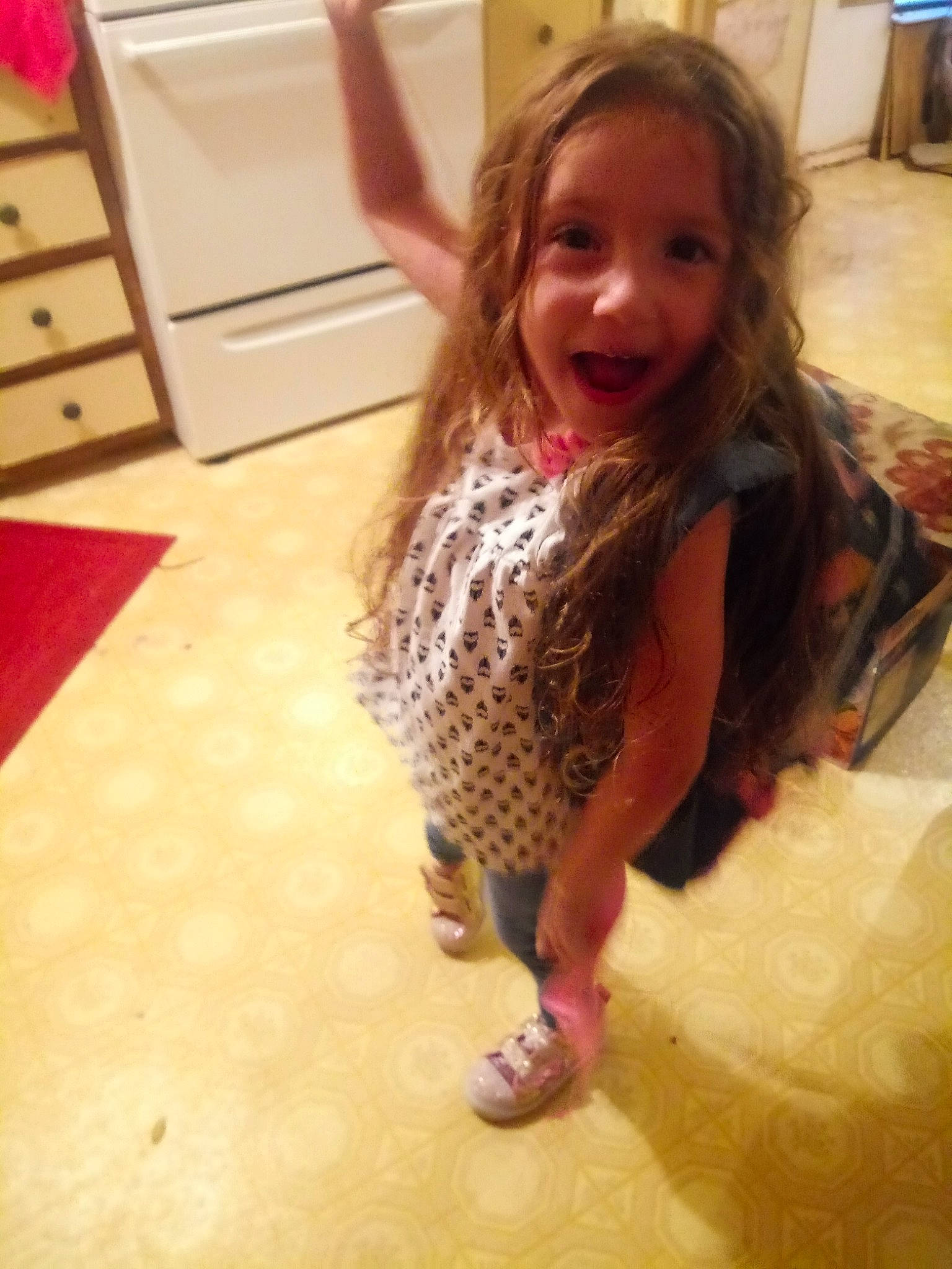 Jayme is registered to the contest to win money with this photo: child, floor, flooring, fun, long_hair, person, play, smile, toddler