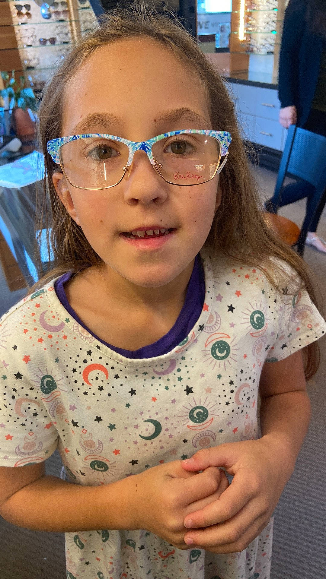 Madison joined the competition — help win amazing prizes! black_hair, blue, chair, cool, eye, eyebrow, eyelash, eyewear, facial_expression, forehead, glasses, happy, lip, nose, organ, person, photograph, skin, sleeve, smile