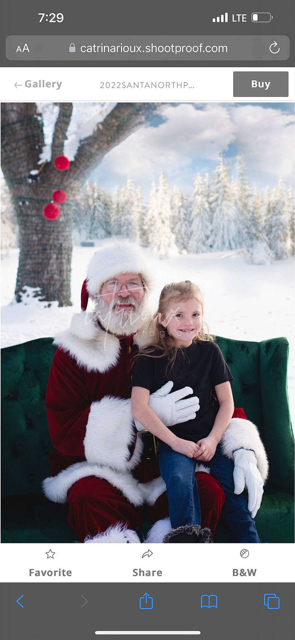 Elizabeth is registered to the contest to win money with this photo: beard, christmas, event, face, freezing, fun, happy, hat, head, headwear, holiday, joy, lap, mammal, person, santa_claus, sky, smile, snow, toddler