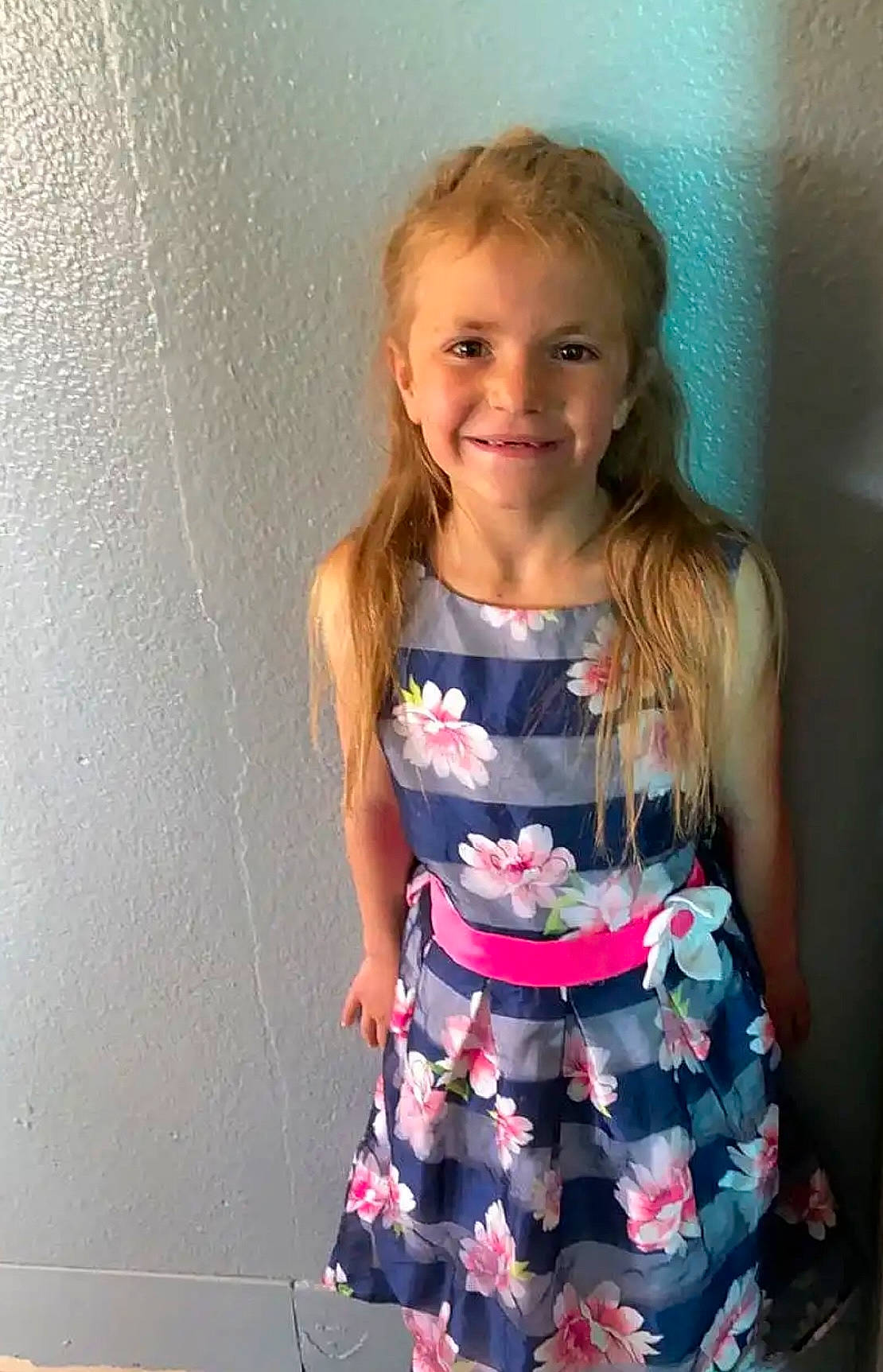 Elizabeth is registered to the contest to win money with this photo: baby_toddler_clothing, child, day_dress, dress, electric_blue, fashion_design, happy, joint, joy, magenta, one_piece_garment, pattern, person, pink, shoulder, sleeve, smile, standing, t_shirt, toddler