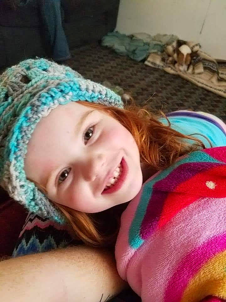 Crimson is registered to the contest to win money with this photo: cap, cool, eye, eyebrow, face, flash_photography, fun, grass, happy, head, headwear, iris, joy, lip, long_hair, mouth, nose, person, pink, skin