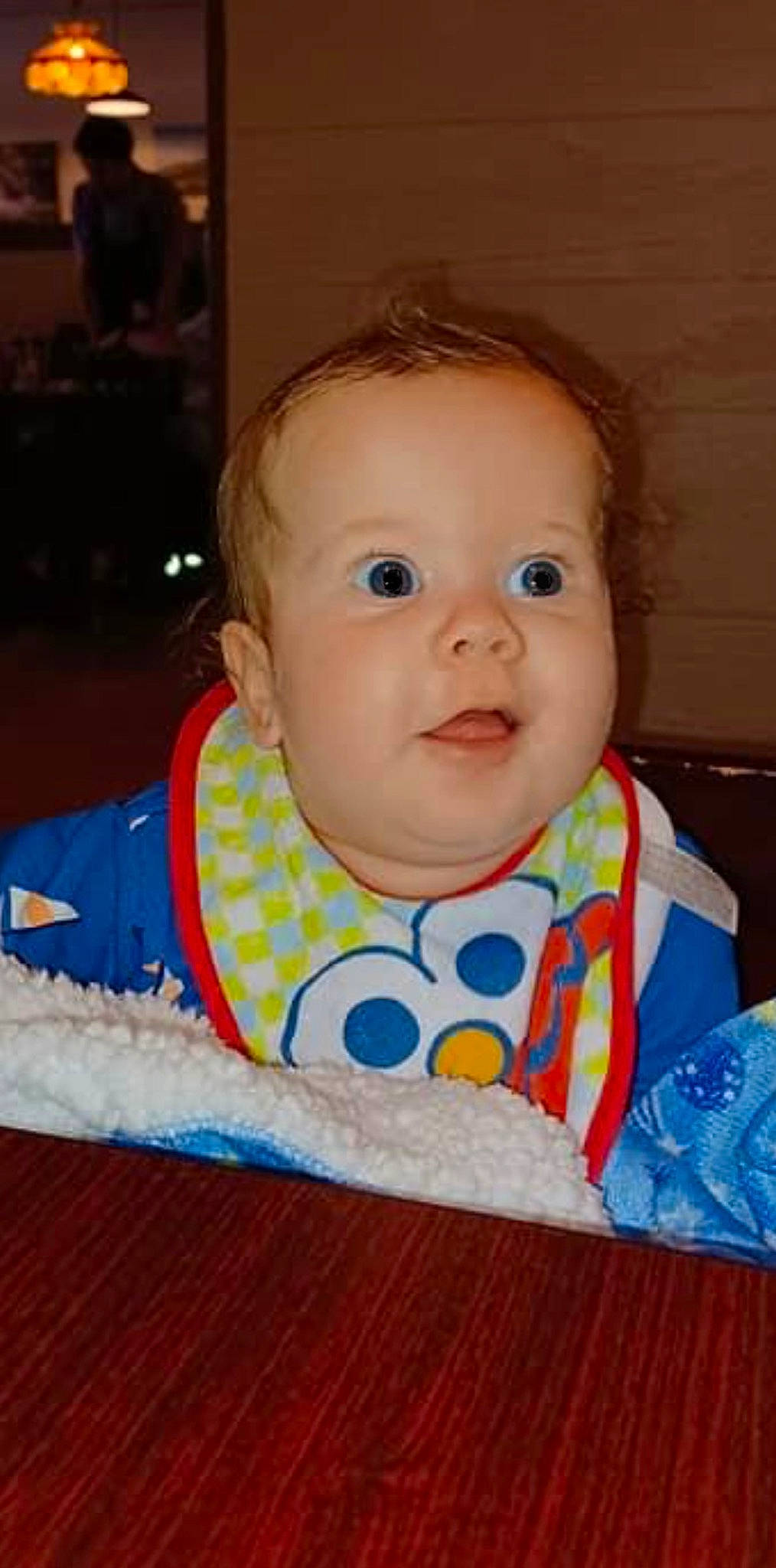 Motley is registered to the contest to win money with this photo: baby, baby_products, baby_toddler_clothing, bib, cheek, child, eyebrow, fun, happy, iris, lip, nose, pattern, person, sitting, skin, sleeve, smile, t_shirt, toddler