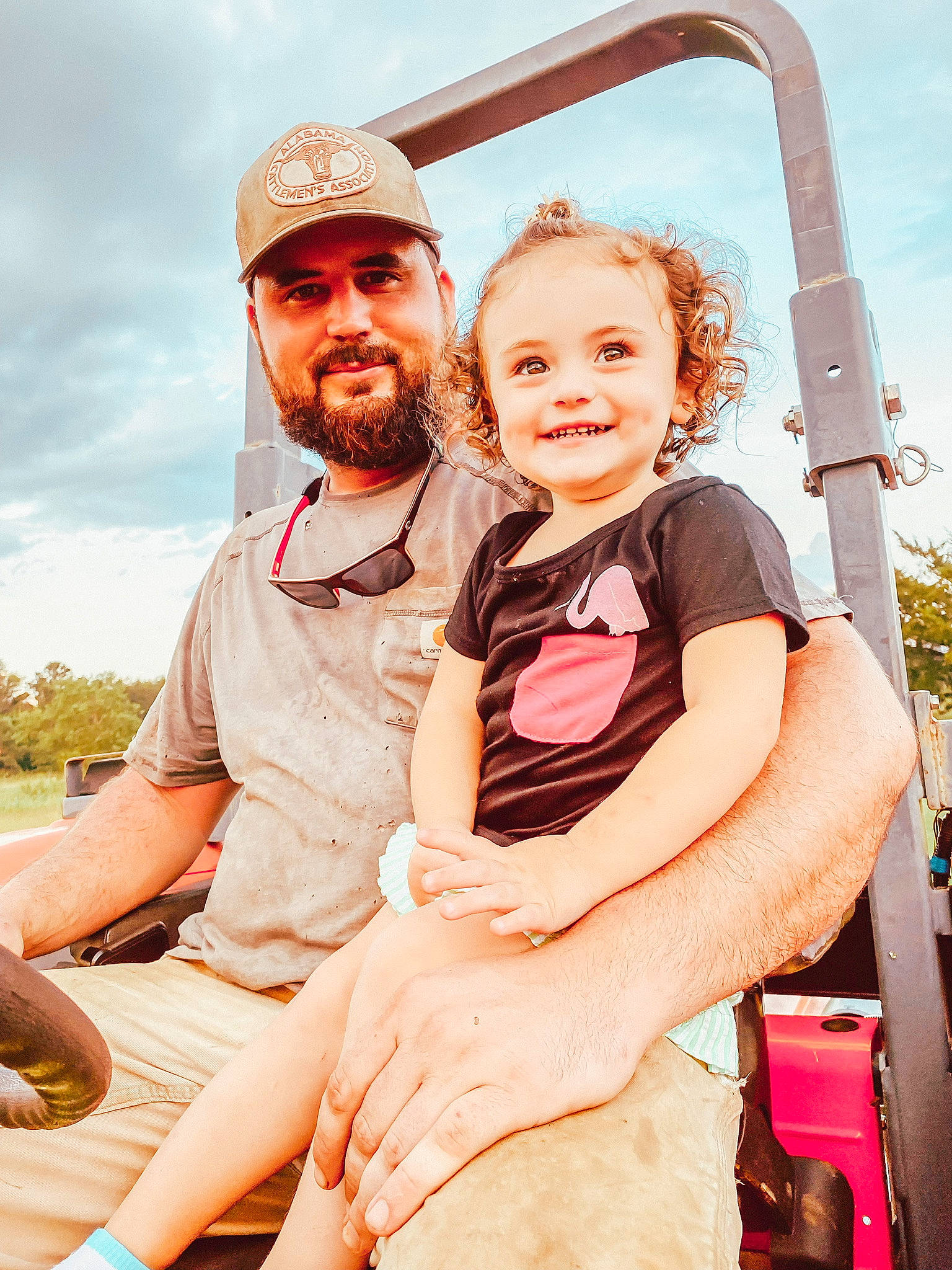 Sara is registered to the contest to win money with this photo: beard, belt, cap, event, eyewear, flash_photography, gesture, happy, hat, headwear, joy, leisure, muscle, person, recreation, sky, smile, sun_hat, thigh, travel
