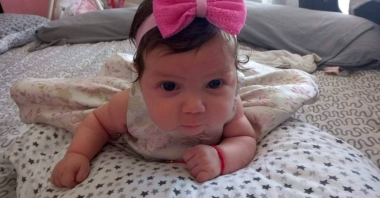 Daria is registered to the contest to win money with this photo: arm, baby, cheek, chin, comfort, eye, eyebrow, gesture, hair, head, human_body, iris, leg, lip, mouth, neck, nose, person, skin, textile