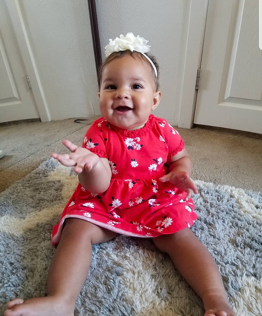 Aaliyah is registered to the contest to win money with this photo: baby, baby_toddler_clothing, child, child_model, leg, pattern, person, pink, sitting, smile, toddler