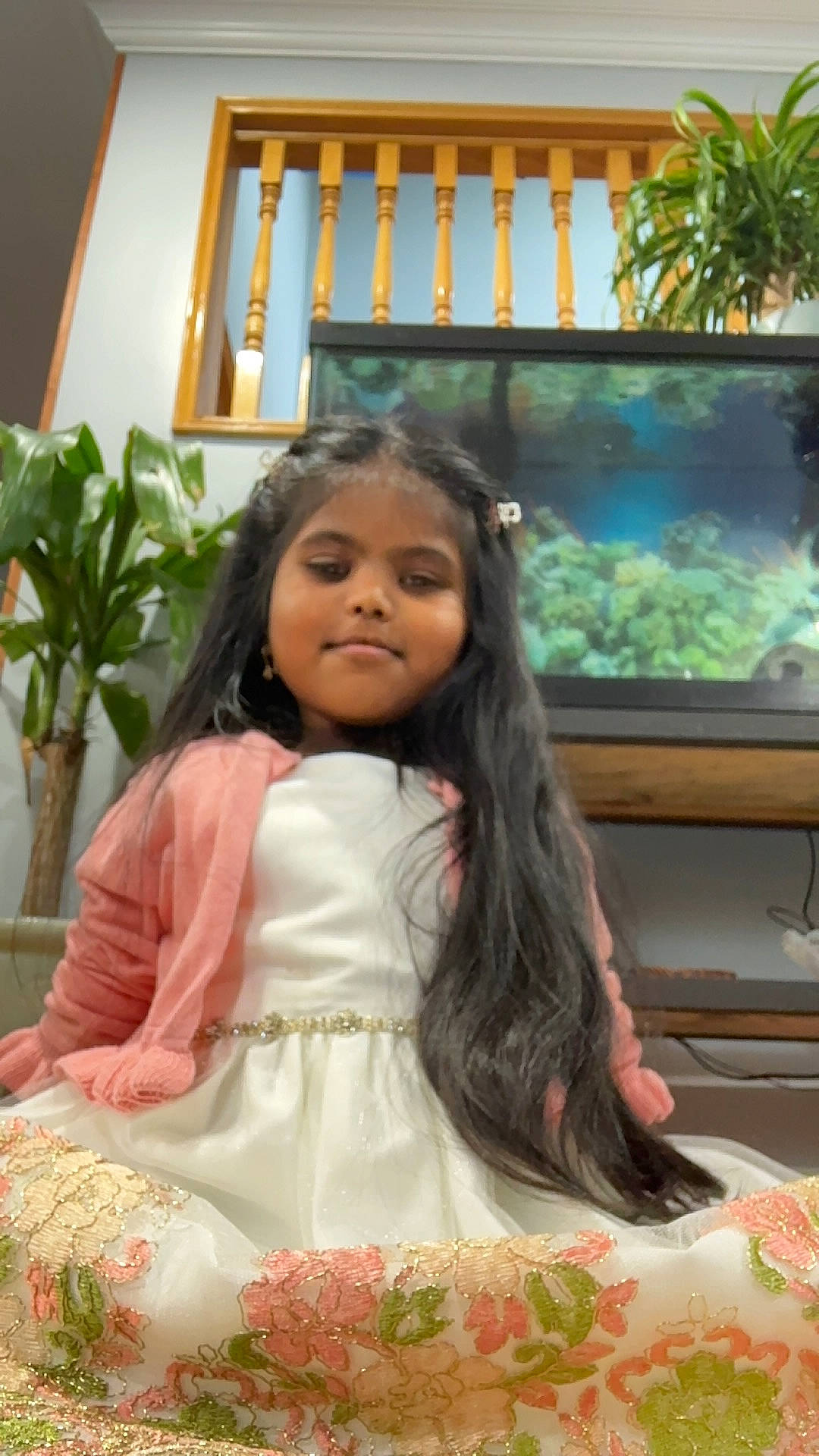 Nyla is registered to the contest to win money with this photo: beauty, bridal_clothing, child, event, eye, floral_design, floristry, flower_arranging, formal_wear, green, happy, house, joy, leisure, person, petal, plant, room, skin, temple