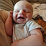 Peter is registered to the contest to win money with this photo: baby, smiling, happy, infant, couch, blanket, comfort, clothing, cute, child, portrait, indoor, relaxation, human, skin, face, expression, joy, toddler, sleeve