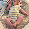 baby, blanket, carpet, child, chubby, clothing, comfort, cute, face, foot, hand, indoor, infant, lying_down, pacifier, plush_mat, rainbow_pillow, relaxed, soft_toys, striped_outfit