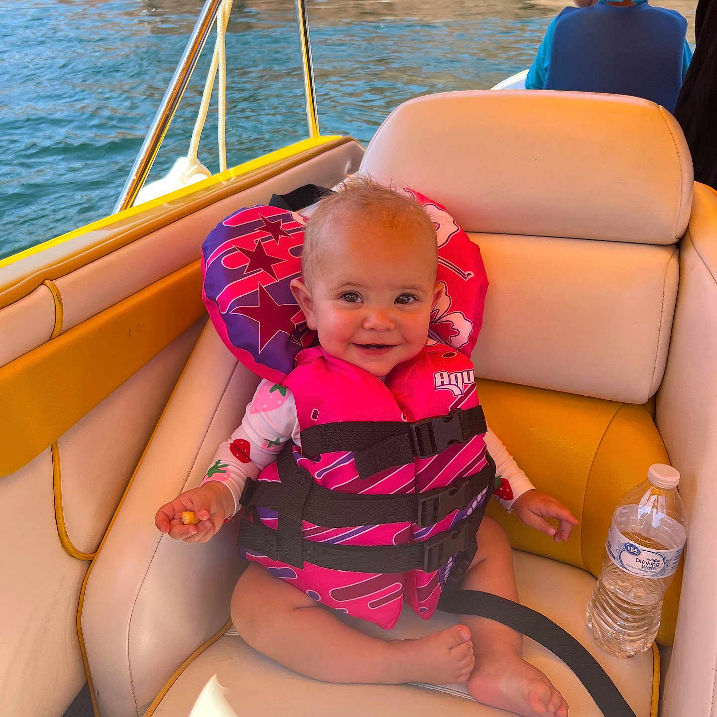 Laramie joined the competition — help win amazing prizes! baby, boat, boy, child, clothing, face, head, lifejacket, male, outdoors, person, photography, portrait, shorts, summer, swimwear, transportation, vehicle, vest, water