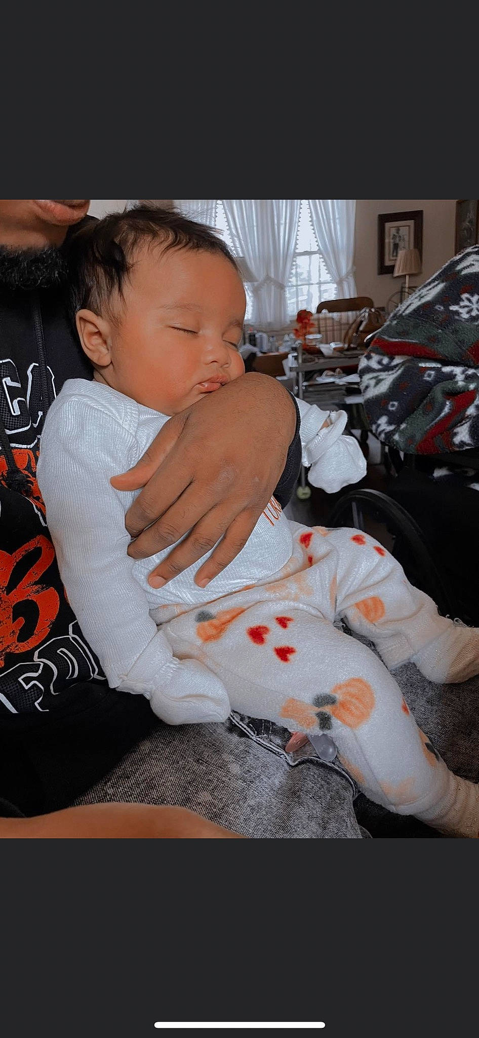 Kamani is registered to the contest to win money with this photo: baby, baby_toddler_clothing, carmine, cheek, child, comfort, flooring, foot, fun, fur, happy, lap, orange, person, room, sitting, sleeve, toddler