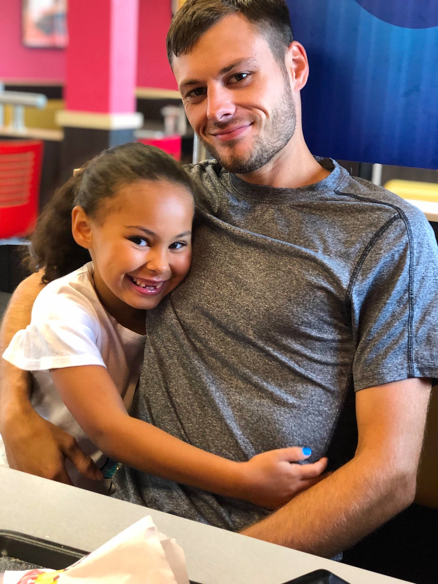 Kherington is registered to the contest to win money with this photo: child, father, fun, joy, person, room, smile, student, t_shirt