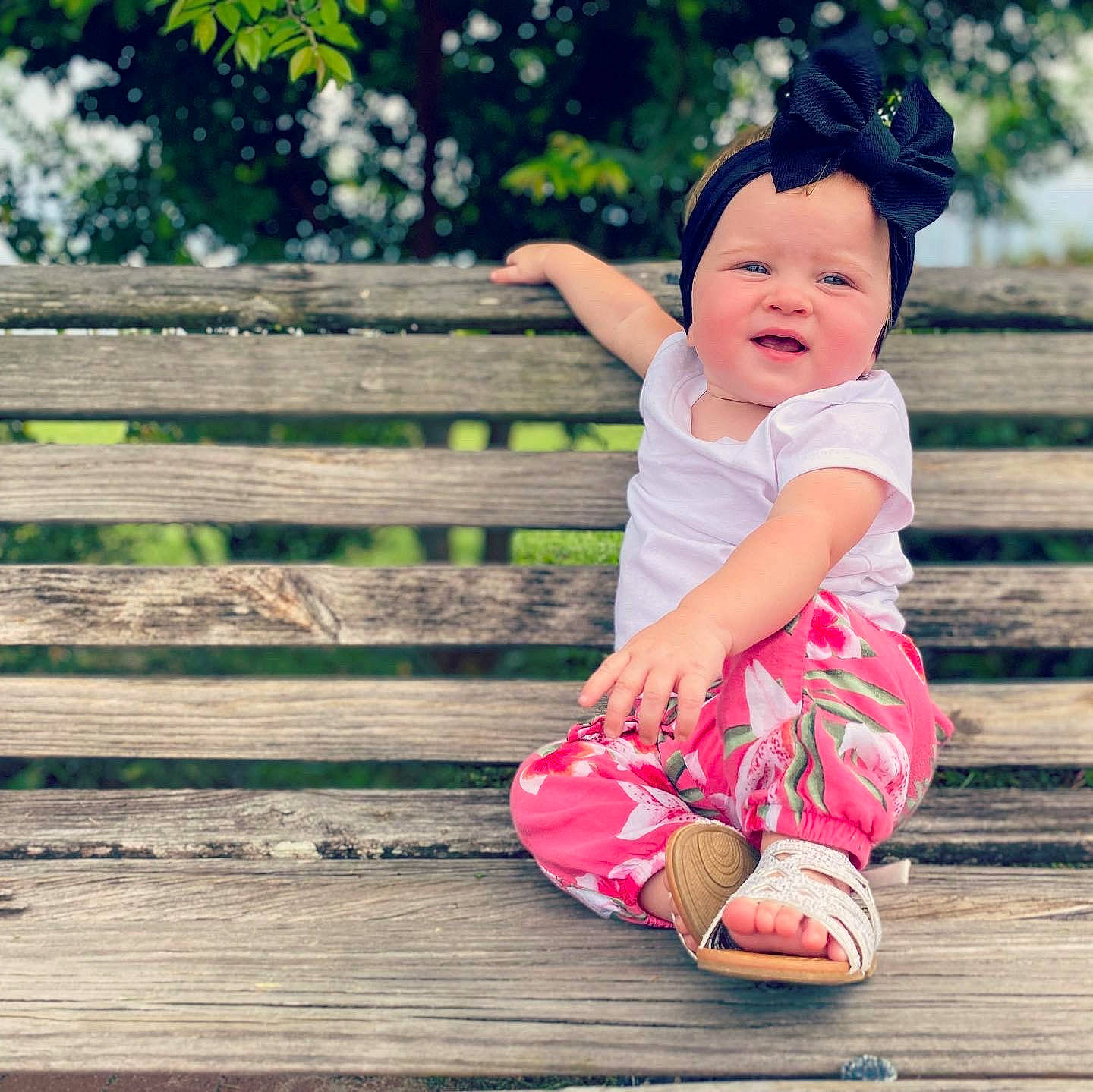 Brynleigh joined the competition — help win amazing prizes! baby, baby_toddler_clothing, cap, child, dress, face, flash_photography, grass, happy, hat, headwear, magenta, pattern, people_in_nature, person, pink, plant, sleeve, smile, toddler