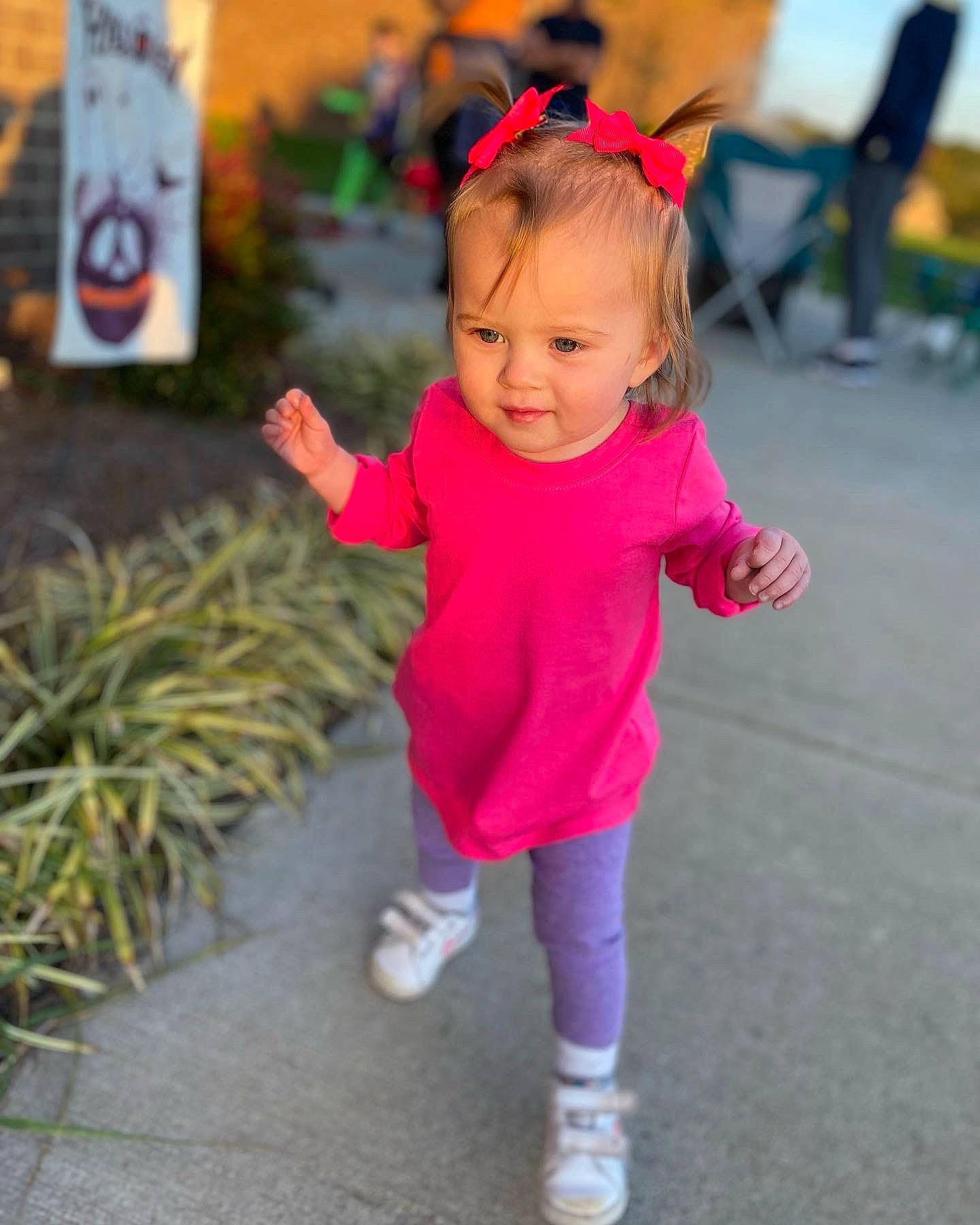 Brynleigh joined the competition — help win amazing prizes! baby, baby_toddler_clothing, chair, child, costume, dress, event, fun, grass, happy, leisure, magenta, person, pink, plant, recreation, sleeve, smile, sock, toddler