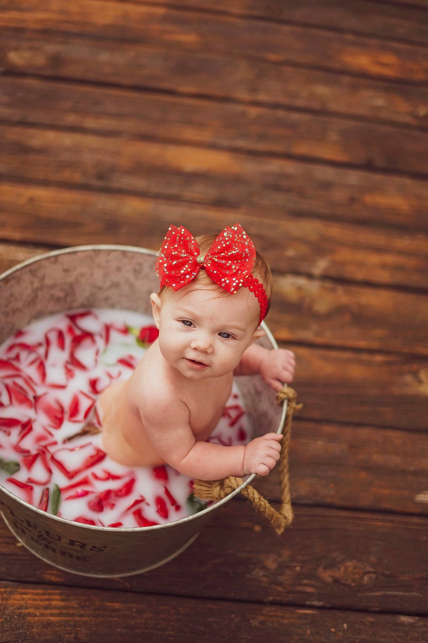 Emmarie is registered to the contest to win money with this photo: baby, bathing, cap, child, fashion_accessory, hair_accessory, headband, headgear, person, pink, red, toddler