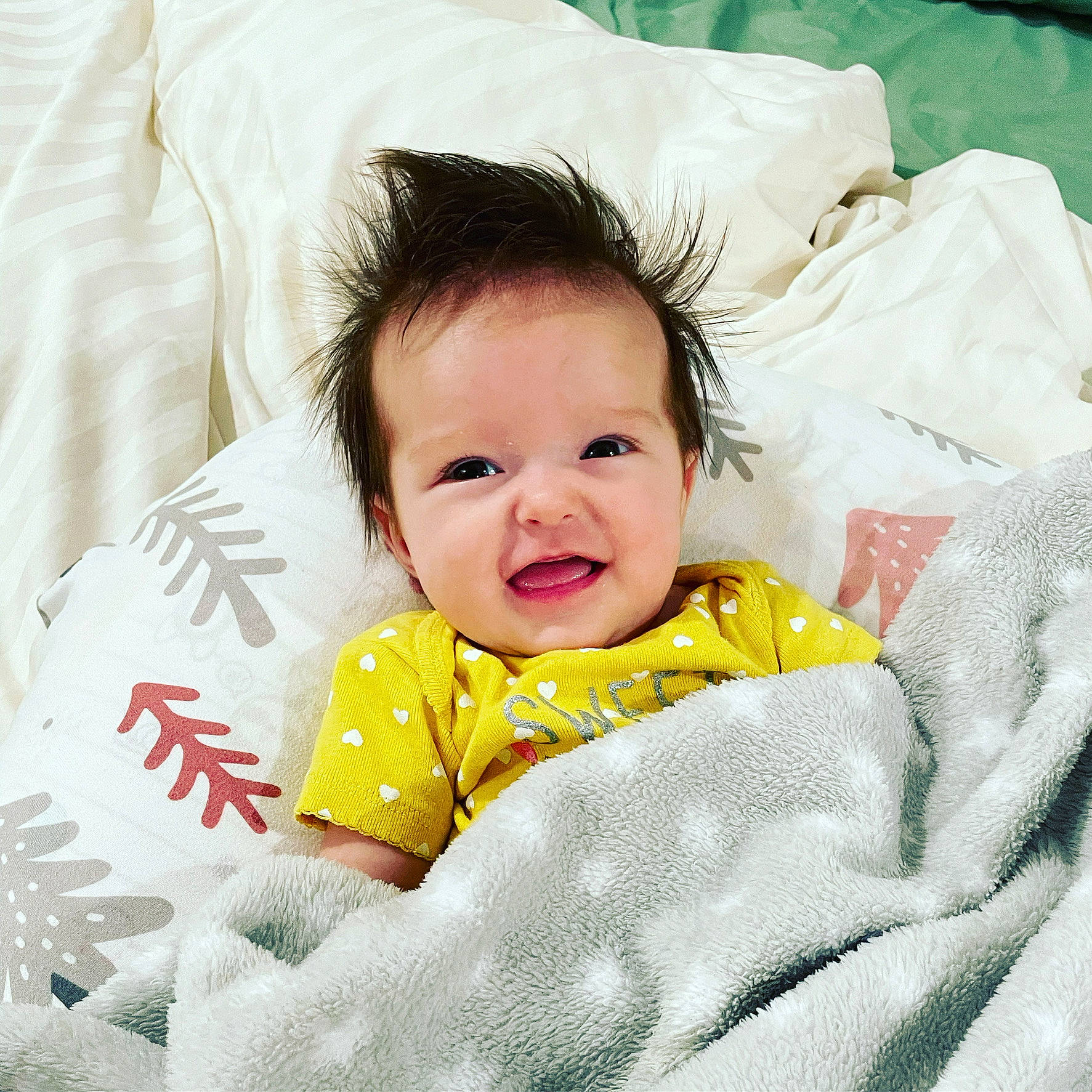 Remi joined the competition — help win amazing prizes! baby, baby_sleeping, baby_toddler_clothing, bedding, cheek, comfort, eye, face, facial_expression, happy, head, linens, mammal, person, product, skin, sleeve, smile, textile, toddler